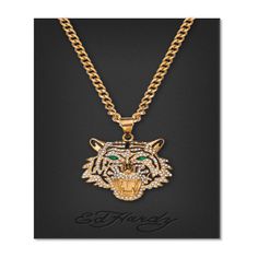 This Ed Hardy crystal stone Tiger pendant necklace is a stunning statement piece that will make any man feel stylish and confident. This eye-catching piece features an intricately detailed metal pendant adorned with hundreds of dazzling crystal stones that capture and reflect the light. Suspended from a simple, yet chic curb chain, this necklace will add a touch of elegance and edge to any look. Fashionable and fun, this pendant necklace is perfect for everyday wear or special occasions and will Men Choker, Tiger Pendant, Gold Sunburst, Lion Pendant, Sterling Silver Cross Pendant, Silver Cross Pendant, Crystal Stones, Mens Gold, Sterling Silver Cross