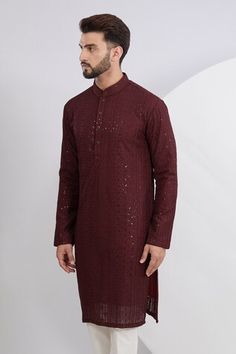 Maroon kurta with thread embroidered floral stripe motifs, embellished by sequins. Comes with a pant. - Aza Fashions Festive Straight Kurta With Sequins, Festive Sequins Straight Kurta, Festive Sequined Straight Kurta, Semi-stitched Straight Kurta With Sequins, Semi-stitched Sequin Straight Kurta, Sequined Straight Kurta For Reception, Long Sleeve Sequin Kurta For Designer Wear, Festive Long Sleeve Sequin Kurta, Traditional Straight Kurta With Sequins