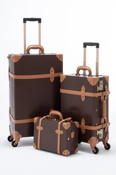 Inspired by the greatest period of traveling, the roaring 1920s, Cotrunkage’s handcrafted minimalism vintage luggage set features a dense wrap-around microfiber leather body that is complemented by heavy-duty corned stitching for maximum protection. The soft leather handle is plush to the touch and wears handsomely over time as the bronze TSA locks lighten with every adventure. We’ve also woven art print lining across the entire bag for a touch of detail and chic flair to sharpen your look. So p Luxury Luggage Sets, Travel Suitcases, House Aesthetics, Travel Luggage Set, Roaring 1920s, 3 Piece Luggage Set, Spinner Luggage Sets, Vintage Suitcases, Woven Art