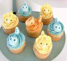 there are many cupcakes that have animals on them