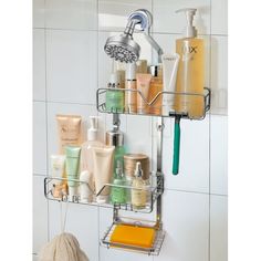 the shower caddy is holding many different types of bathroom products in it's holder