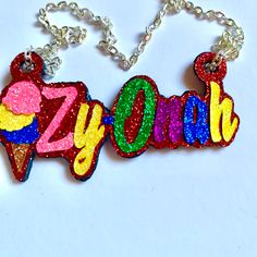 Personalized Ice Cream Name Necklace. Hand made and personalized to your liking. Every piece is made with love. **FREE SHIPPING OVER $35.00* Great gift for birthdays, sisters, Mother's Day, teenagers, kids, and much more! Please provide: 1. Name 2. Desired font 3. Main font color 4. Background/offset color 5. Chain length Rainbow print placement may vary Multicolor Themed Personalized Jewelry, Fun Multicolor Personalized Charm Necklaces, Fun Handmade Charm Necklaces For Birthdays, Fun Charm Necklaces With Lobster Clasp For Gifts, Whimsical Personalized Necklace For Birthday Gift, Whimsical Personalized Necklaces For Gifts, Multicolor Handmade Charm Necklace For Birthday, Handmade Red Necklaces For Birthday, Handmade Red Necklace For Birthday