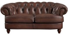 a brown leather couch sitting on top of a white floor