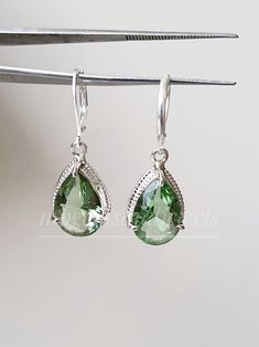 Green Amethyst Earring Natural Green Amethyst teardrop dangle earrings, Green gemstone drop earrings, February birthstone, gift for her,925 sterling Silver Earring gemstone-10x14mm <> Green amethyst strengthens peace and calm, and brings generosity, growth, health, happiness, harmony, stability, and fertility. Green is the color of Nature and as such it helps relieving tensions and irritation. It symbolise self respect and wellbeing. FREE SHIPPING AND USPS TRACKED PARCELS WORLDWIDE. Our products Green Amethyst Earrings, Gemstone Drop Earrings, Teardrop Dangle Earrings, Green Amethyst, Amethyst Earrings, Green Gemstones, February Birth Stone, 925 Sterling Silver Earrings, Gemstone Earrings