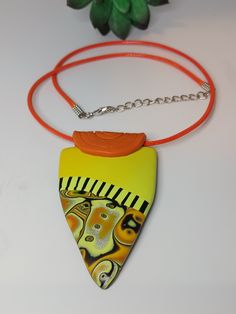 Hand Painted Polymer Clay Pendant Necklace, Artistic Polymer Clay Pendant Necklace, Artistic Polymer Clay Pendant Necklaces, Unique Hand Painted Orange Necklace, Hand Painted Orange Necklace For Gifts, Hand Painted Orange Necklace For Gift, Orange Hand Painted Necklace For Gift, Unique Yellow Polymer Clay Jewelry, How To Clean Earrings