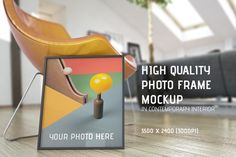 a photo frame mockup with a chair and table in the background for an advertisement