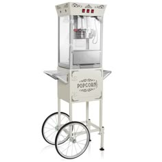 an old fashioned popcorn machine on wheels