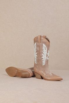 Embrace a feminine and flirty style at your next rodeo with the IDALY - Pastel Western Mid Boots. Crafted from smooth faux leather, these mid-calf boots are perfect for any festival scene, featuring a classic pointed-toe and intricate Western-inspired detailing in soft pink and beige hues. The curved topline with side pull tabs ensures easy on-and-off, while the wood-look stacked heel adds just the right amount of height. These boots combine charm and practicality, making them a must-have for th Fall Snip Toe Knee-high Boots For Rodeo, Snip Toe Knee-high Boots For Rodeo And Fall, Spring Rodeo Knee-high Boots With Snip Toe, Spring Season Rodeo Knee-high Boots With Snip Toe, Spring Knee-high Boots With Snip Toe For Rodeo, Western Knee-high Boots For Spring, Wide Calf Snip Toe Knee-high Boots For Spring, Wide Calf Knee-high Boots With Snip Toe For Spring, Chic Summer Boots For Rodeo