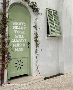 a green door that says whats meant to be, will always find a way