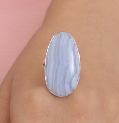 Blue Lace Agate Ring, 925 Solid Sterling Silver Ring, Oval Gemstone Ring, Handmade Silver Jewellery, Statement Ring, Women Silver Ring Gemstone Name - Blue Lace Agate Stone Quality - AAA Ring Weight - 8.62 gm Length - 3.2 cm  Width - 1.8 cm Stone Shape - As shown in the picture Ring Size - All Ring Size Available    You'll get the exact product as shown in the pictures We serve complete 925 sterling silver Jewelry and genuine properties of the stone. The products are dispatched from the small business from USA. Product Quality and Packaging - Our all products are 925 Silver Stamped which shows that the product is genuine and authentic .The products are dispatched from the small business from USA so you get the product on time and the product packaging comes in bubble foil wrap with all the Luxury Sterling Silver Oval Cabochon Ring, Sterling Silver Oval Cabochon Gemstone Ring, Blue Oval Sterling Silver Crystal Ring, Blue Lace Agate Jewelry, Handmade Silver Jewellery, Hippy Gifts, Agate Ring, Blue Lace Agate, Lace Agate