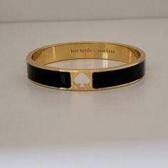 Gold Tone Kate Spade Hole Punch Bracelet. Brand New With Tags Price Crossed Out Idkw Removed Tag Only For Photos. Bag Included. Measurements In Photos. Smoke & Pet Free Home. Any Questions Feel Free To Message Me. I Do Accept Reasonable Offers! Bundle & Save! Kate Spade Elegant Black Jewelry, Elegant Black Kate Spade Jewelry, Classic Black Bracelets As Fashion Accessory, Elegant Bracelets With Black Band, Spade Jewelry, Kate Spade Jewelry, Hole Punch, Gold Black, Womens Jewelry Bracelets