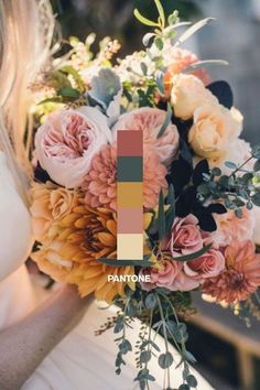 a woman holding a bouquet of flowers in her hands with the color pantone on it