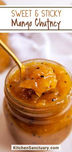 sweet and sticky mango chutney in a glass jar with a spoon on top