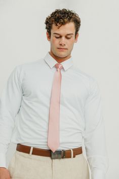 Indulge in luxury with our Solid Mauve Tie, perfect for weddings and special events. Made from high-quality polyester satin, its elegant sheen is sure to elevate your look. This popular tie is a must-have for any stylish and sophisticated wardrobe. Available in 2 Sizes: Skinny - 2.5" Width, 58" Length Wide - 3" Width, 60" Length Fabric: Handmade from 100% Polyester Satin Mauve Tie, Sophisticated Wardrobe, Boys Ties, Solid & Striped, White Shirt Dress, Polyester Satin, Elevate Your Look, Pocket Square, Silk Satin