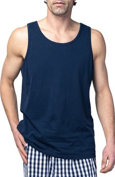 This staple pima cotton tank top will introduce an element of luxury to sleeptime with its buttery feel that only gets softer wash after wash. Crewneck Sleeveless 100% pima cotton Machine wash, dry flat Made in Peru Cotton Vest For Summer Loungewear, Comfortable Sleeveless Cotton Tank Top, Basic Cotton Vest With Scoop Neck, Casual Cotton Tank Top For Everyday, Blue Relaxed Fit Tank Top, Relaxed Fit Sleeveless Cotton Vest, Relaxed Fit Cotton Muscle Tank Tee, Cotton Solid Color Tank Top For Loungewear, Summer Cotton Muscle Tee For Loungewear