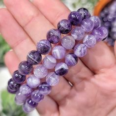 To stay updated with new items follow us on Instagram @LovingThyselfRocks OR Click the link below! https://www.instagram.com/lovingthyselfrocks/ ONE Chevron Amethyst Bracelet Intuitively selected. Bead Size: 8mm or 12mm Wrist size is 6 1/2 in, stretchy string. Chakras: Third and Crown Benefits of Amethyst: -Best crystal for meditation. -Encourages mind to be humble. -Increases understanding of intuition. -Encourages the mind to surrender to that which is greater than itself. -Develops direction Bracelet Chevron, I Am Calm, Amethyst Healing Properties, Psychic Gifts, Chevron Amethyst, Amethyst Healing, Meditation Crystals, Mind Body And Soul, Amethyst Bracelet