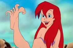 ariel from the little mermaid with her arms stretched out in front of her face and chest