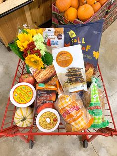 a shopping cart filled with lots of food