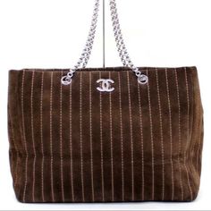 Gorgeous Chanel Brown Suede Striped Stitch Silver Tone Tote! There Are Some Slight Wears On Corners And Edges But Overall It Remains In Great Pre-Owned Condition. The Interior Is Also In Excellent Condition With Only Minimum To No Wears: It’s Super Clean, No Stains, No Holes. The Silvertone Cc Logo And Metal Chain Is Still Shiny And Beautiful. Zipper Closure. Includes The Original Dust Bag. Measurements: 13”(W)*10”(H)*6”(D) Chanel Brown Tote, Chanel Gst, Beige Tote Bag, Navy Chanel, Beige Tote, Chanel Purse, Pink Chanel, Bag Measurements, Perforated Leather