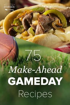 a sandwich with meat, peppers and cheese on it next to a football in the grass