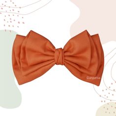 an orange bow tie is shown on a pink and white background with circles around it