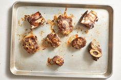 some food that is sitting on a pan and ready to be cooked in the oven