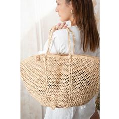 Embrace the essence of summer with our exquisitely crafted Sinah beach bag, a spacious and beautifully designed accessory perfect for both city strolls and sunny beach days. Handmade with love and care by talented women artisans in Madagascar, this intricately weaved bag showcases their traditional craftsmanship, making each piece unique and special.  By choosing the "Madagascar Summer Breeze" beach bag, you support the livelihoods of women artisans in Madagascar, empowering them to continue the Sand-colored Straw Bag For Summer Beach, Chic Sand-colored Summer Shoulder Bag, Summer Woven Sand-colored Shoulder Bag, Beige Summer Beach Bag For Daily Use, Summer Vacation Sand Crochet Bag, Summer Vacation Crochet Bag In Sand Color, Sand-colored Crochet Bag For Summer Vacation, Eco-friendly Beige Beach Bag, Chic Beach Bag Made Of Natural Fiber