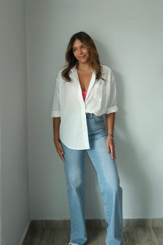 This 100% cotton Bria Relaxed Button Down Shirt features a collared neckline, long sleeves, and a relaxed fit that runs true to size. Designed for ultimate comfort and style, this shirt is perfect for any occasion. Trust our size chart and get yours today. Model is wearing small. Women Wearing Button Down Shirts, Grey Button Down Shirt Outfit Women, Button Up Winter Outfit, Women’s Button Down Shirt, Long White Button Down Shirt Outfit, Open Button Down Shirt Outfit, Silk Button Down Shirt Outfit, Blue Button Down Shirt Outfit, White Button Up Shirt Outfit