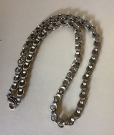 "Monet stainless steel color or dark silver color rolo/belcher/cable chain necklace  Approximately 18 1/4\" with clasp x 5/16\" w.  Marked: Monet tag ( copyright symbol Monet )   Very good condition  07/11/23 1338" Stainless Steel Link Necklace With Silver Chain, Gunmetal Cable Chain Link Necklace, Silver Stainless Steel Necklace With Lobster Clasp, Silver Stainless Steel Oval Link Chain Necklace, Silver Metal Cable Chain Necklace, White Gold Stainless Steel Oval Link Necklace, Nickel-free Metal Link Chain Necklace, Gunmetal Box Chain Stainless Steel Necklace, Gunmetal Stainless Steel Box Chain Necklace