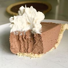 a piece of chocolate pie with whipped cream on top