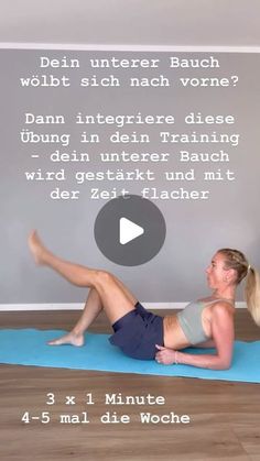 a woman is doing yoga on a mat in front of a gray wall with words describing how to do the splits