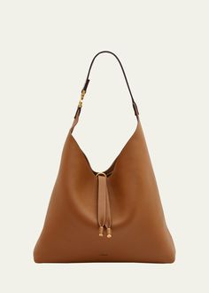 Get free shipping on Chloe Marcie Grained Leather Hobo Bag at Bergdorf Goodman. Shop the latest luxury fashions from top designers. Luxury Hobo Bag With Leather Lining, Double Handle Shoulder Bag In Pebbled Leather, Everyday Calf Leather Pouch Bag, Top Handle Bag In Pebbled Leather With Leather Lining, Smooth Grain Calf Leather Bucket Bag, Classic Pebbled Leather Bag, Business Bags With Gold-tone Hardware And Pebbled Leather, Classic Calf Leather Hobo Bag For Shopping, Calf Leather Hobo Tote Bag