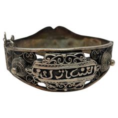 Antique Moorish North Africa Silver Cuff Bracelet. Antique Tunisian, Algeria or Moroccan silver cuff. In good condition, sturdy and high quality design, Maker's mark on outer edge. A well made silver bracelet from North Africa from the French Colonial Times. The Arabic calligraphy is stylized Arabic script. This type of bracelet was produced for European rather than local consumption and were mentioned in the seminal work of Paul Eudel: Dictionnaire des bijoux de l'Afrique du Nord : Maroc, Algérie, Tunisie, Tripolitaine (1906). They were known as "Meqiâsat Tounès" or Tunis bracelets, because they mimic a style of bracelet that was originally made in Tunis after the Turkish Islamic design. Vintage Moorish Etruscan Style Silver Filigree Hinged bangle with Islamic Arabic Calligraphy. A beauti Handmade Antique Jewelry, Yellow Gold Cuff Bracelet, Islamic Arabic Calligraphy, Calligraphy A, Victorian Style Jewelry, Arabic Script, Diamond Cuff Bracelet, Colonial Times, French Colonial