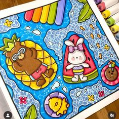 a coloring book with an image of a bear and other animals on the cover, surrounded by crayons