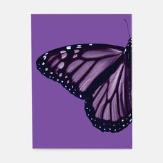 a purple butterfly with black spots on it's wings