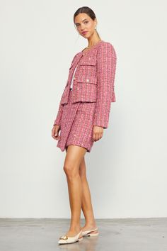 This tweed jacket offers a classic design in shades of pink with multicolor accents. Boxy and highly textured, the style has flap pockets, embossed gold-tone buttons, and padded shoulders for a bit of structure. Style yours with our matching miniskirt for a coordinated set, or take the look casual with denim. •Round neckline •Flap pockets •Button closures •Padded shoulders •Long sleeves •Boxy fit Item Number: 25789 100% POLYESTER Pink Tweed Jacket With Buttons For Fall, Formal Pink Tweed Blazer, Pink Single Breasted Tweed Jacket For Fall, Pink Single-breasted Tweed Jacket For Fall, Pink Tweed Jacket For Office, Pink Tweed Workwear Jacket With Buttons, Pink Single-breasted Tweed Jacket, Pink Tweed Office Jacket, Pink Tweed Jacket For Workwear