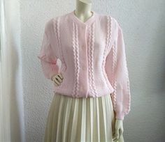 60s spring cardigan baby pink sweater lace romantic sweater summer feminine cardigan cable knit soft acryl fabric large sleeve 42/44 size. Good vintage condition but the item is not dry clean. please check the measurements before ordering Measurements laying flat : shoulders :50 cm (19,5 inches) bust:53 cm (21 inches) total lenght :61 cm (24 inches) sleeve lenght :54 cm (21 inches) Pink Soft Knit Cardigan, Cute Pink Soft Knit Cardigan, Pink Vintage Winter Cardigan, Baby Pink Sweater, Vintage Pink Knit Cardigan, Pink Knit Button-up Cardigan, Pink Cable Knit Sweater, Spring Cardigans, Pull Rose