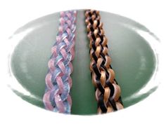 two different colored chains sitting on top of a green plate