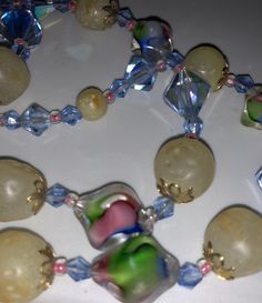 "Fabulous triple strand glass necklace compromised of crystal and art glass beads, circa 1950s-60s, triple strand glass bead necklace choker length, shortest top strand is approx. 15\" long plus an extender, And the two additional strands are considerably longer to give it a nice bib appearance In very good condition, this feels strong and ready to wear, but like all my necklaces, I can never guarantee that they will not eventually need to be restrung. Make sure to view all photos carefully and Glass Faceted Beads Costume Necklace, Single Strand Glass Jewelry For Parties, Vintage Glass Jewelry With Round Beads, Retro Round Beaded Glass Jewelry, Glass Beaded Necklaces For Jewelry Making, Vintage Adjustable Glass Jewelry, Vintage Glass Beaded Single Strand Necklace, Multi-strand Glass Jewelry For Party, Vintage Glass Beaded Necklaces For Jewelry Making