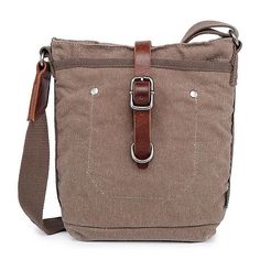 Included: 1 Key Ring StrapFeatures: Lead Free, Adjustable StrapsClosure Type: ZipperPockets: 1 Inside Zip Pocket, 2 Inside Elastic PocketsMeasurements: 10 Height/Inches, 3 Depth/Inches, 8 Width/InchesMax Strap Drop Length: 24 InchesBase Material: 75% Canvas, 25% LeatherCare: Spot Clean, Dry Clean OnlyCountry of Origin: Imported Large Capacity Crossbody Canvas Bag For Outdoor, Outdoor Large Capacity Crossbody Canvas Bag, Brown Outdoor Shoulder Bag With Anti-theft Pocket, Brown Shoulder Bag With Anti-theft Pocket For Outdoor, Outdoor Canvas Shoulder Bag With Zipper Pocket, Outdoor Crossbody Shoulder Bag With Pockets, Durable Casual Backpack, Casual Durable Backpack, Crossbody Backpack With Anti-theft Pocket For Outdoor Activities