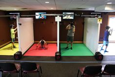 two men are practicing their moves in the gym