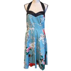 Dresstells Blue Floral 1950s Vintage Cocktail Party Retro Halter Dress This 50s Rockabilly Swing Dress Is Perfect For Party Celebration, Which Will Help You Balance Your Weekend Fun And Trendy Needs. A-Line Shape, Sweetheart Neckline, - All These Designs Are For Your Vintage Pinup Style! Sleeveless Blue Dress For Vintage Fashion, Blue Midi Dress With Fitted Bodice For Garden Party, Blue A-line Vintage Fashion Dress, Retro Blue Midi Dress For Spring, Blue Retro Midi Dress For Spring, Blue Lined Vintage Dress For Summer, Blue Halter Neck Dress For Garden Party, Blue Fitted Vintage Dress For Vintage Occasions, Blue A-line Vintage Dress For Party