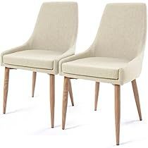 two beige chairs with wooden legs on a white background