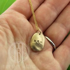 "One child's fingerprint in solid silver or solid bronze. The silver is paired with a sterling silver adjustable chain and the bronze with a 14k gf adjustable chain. This listing is for one child's fingerprint that is taken from a mold and fired as a solid, bronze or solid silver charm to cherish forever. If you would like an adult print or a child's thumb print rather than a child's finger print, send me a message and I'd be happy to create a custom listing for you, as they require more metal. Hand Stamped Sterling Silver Oval Pendant, Sterling Silver Hand Stamped Oval Pendant Jewelry, Personalized Oval 14k Gold Jewelry, Personalized Minimalist Keepsake Jewelry, Minimalist Personalized Keepsake Jewelry, Silver Hand Stamped Oval Pendant Jewelry, Minimalist Stamped Pendant Jewelry, Silver Oval Pendant Jewelry Hand Stamped, Adjustable Hand Stamped Jewelry For Anniversary