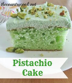 a piece of pistachio cake on a white plate with the title overlay