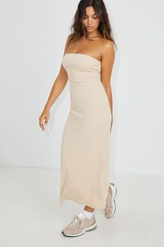 She's looking elegant! Features - Strapless - Ribbed - Double lined - Stretchy Size & Fit - Fit: Fitted - Length: Maxi - Model is wearing size S Materials & Care - Content: 81% polyester, 10% viscose, 9% spandex - Care: Machine wash, cold - Imported Maxi Tube Dress, White Maxi, Tube Dress, White Maxi Dresses, Dress Size Chart, Dress White, Maxi Dresses, White Dress, Garage