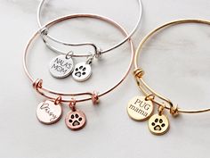 "Dog Mom Bracelet - Personalized Birthstone Bracelet, Paw Print Bracelet, Pet Memorial Bracelet, Our Personalized Dog Mom Bracelet includes an engraved disc, a paw print charm, and up to 10 Swarovski birthstone dangles. Choose from silver or gold and new font choices. Disc can be engraved with a name, date, or nickname. TO ORDER: 1) Select your quantity 2) Select your metal color + number of birthstones 3) Select your font 4) Enter the text to engrave on the disc, and your birthstones in the per Adjustable Charm Bracelet Gift For Best Friend, Adjustable Charm Bracelet Best Friend Gift, Adjustable Charm Bracelet For Best Friend Gift, Adjustable Round Bracelet As Best Friend Gift, Nickel-free Bracelet For Best Friend Gift, Charms Bracelet For Mother's Day, Mother's Day Bracelets With Charms, Charms Bracelets For Mother's Day, Adjustable Charms Bangle For Gift