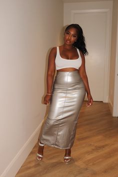 Fitting silver midi skirt. Shiny smooth material. Elastic waistband midi skirt. Some stretch. High back split. Model is wearing a small. Silver Midi Skirt, Metallic Midi Skirt, Luxe Life, Weekend Style, Plus Size Swimwear, Two Piece Dress, Long Sleeve Maxi Dress, Skirt Fashion, Winter Women