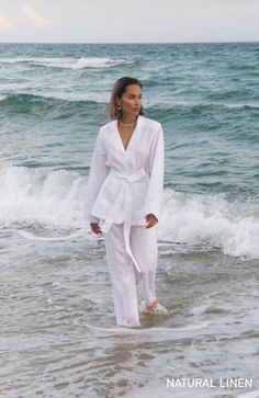 These natural women's pajama-style suits are made of organic linen fabric and are perfect for a walk or for home. Details are a belt on the waist and wooden buttons. The suits look really gorgeous!  This material absorbs excess moisture from the skin and does not conduct static electricity. Composition: 100% linen WE OFFER DISCOUNTS ON THE MULTIPLE ORDER (just write to us to know the details). Elegant and comfortable linen jacket and pants. The perfect outfit for everyday or special occasions. A Luxury Off-white Silk Sets, Chic Luxury Linen Sets, Luxury White Tunic Sets, Luxury Long Sleeve Linen Suits, Luxury White Cotton Silk Sets, Luxury Unstitched White Sets, Luxury White Jamawar Sets, Luxury White Sleepwear For Spring, Luxury Chic Linen Sets