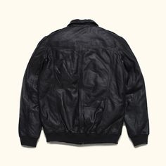 Introducing our Black Vintage Bomber Jacket – a timeless piece that transcends rugged elegance and the classic aviation charm. Crafted with 100% genuine lambskin leather - it has a soft and broken in feel to it that looks like its been handled with generations of care. Our black leather bomber jacket features a full zip up closure, color matched ribbed cuffs and waist, and a unique detachable sherpa collar that can be removed, or worn, to provide extra warmth and comfort for brisk nights on the Waxed Canvas Jacket, Aviator Leather Jacket, Dark Brown Leather Jacket, Vintage Man, Leather Camera Bag, Leather Jacket Style, Lambskin Leather Jacket, Leather Duffle Bag, Leather Travel Bag